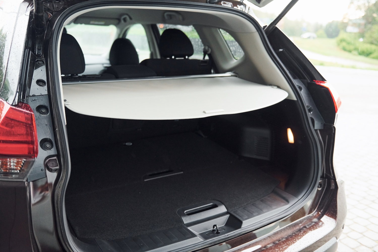 a newly installed rear used parcel shelf on in a modern black car