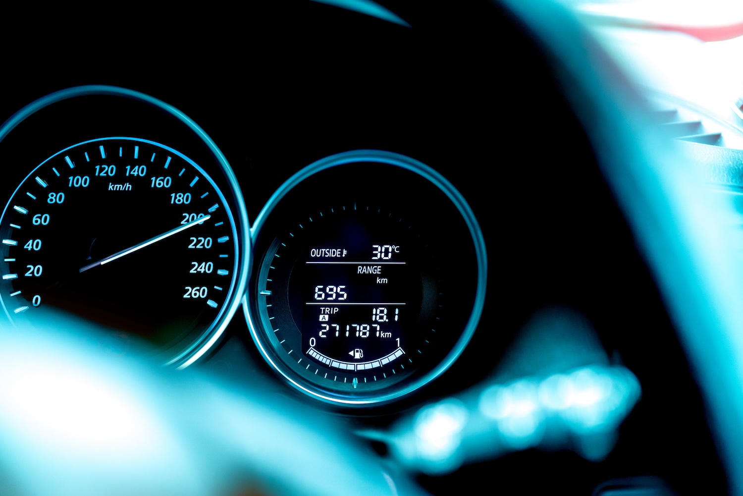 A car speedometer replacement that has been fitted in a car